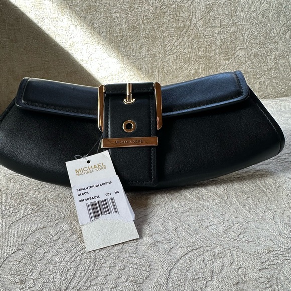 Michael Kors Handbags - Michael Kors Black Curved Clutch with Gold Accents